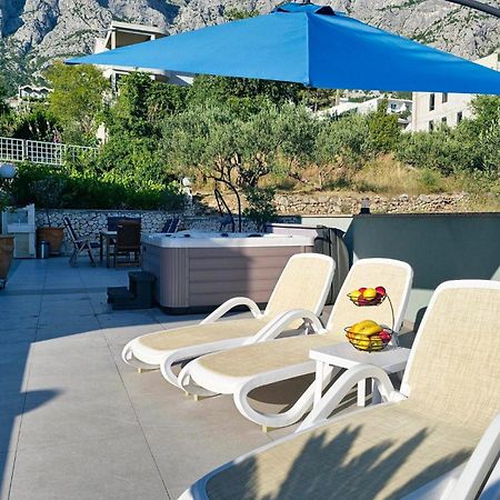 Amazing Apartment In Makarska With House Sea View ภายนอก รูปภาพ